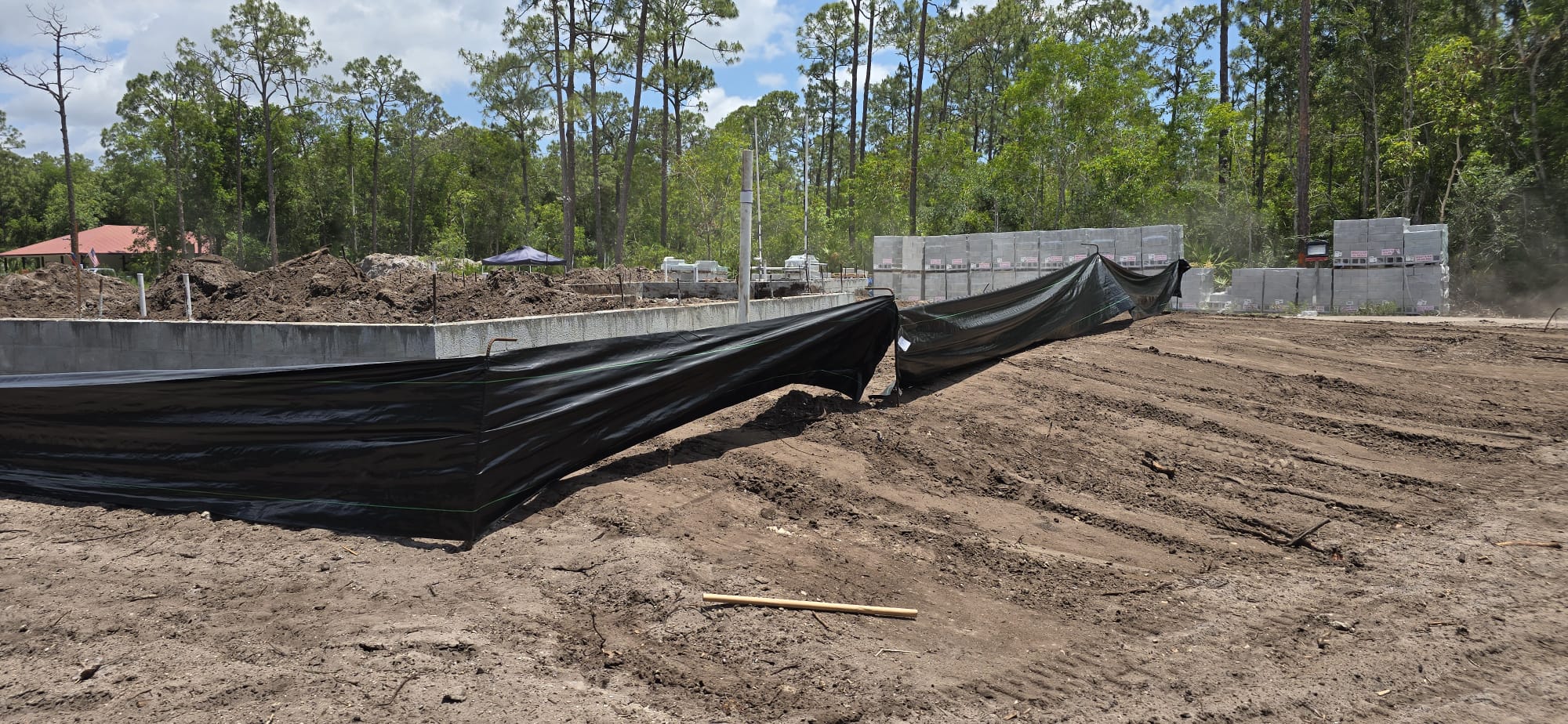 Foundation area with block materials staged on site