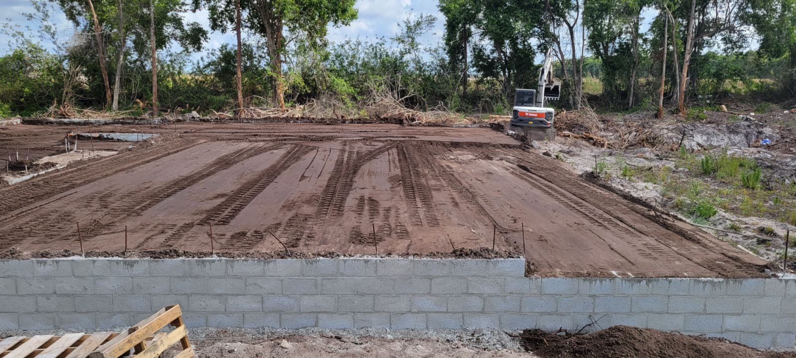 Grading and foundation layout before slab work